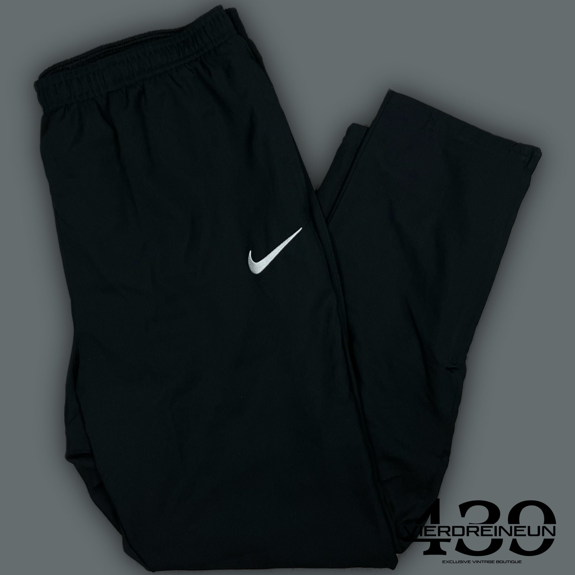 vintage Nike trackpants {L}