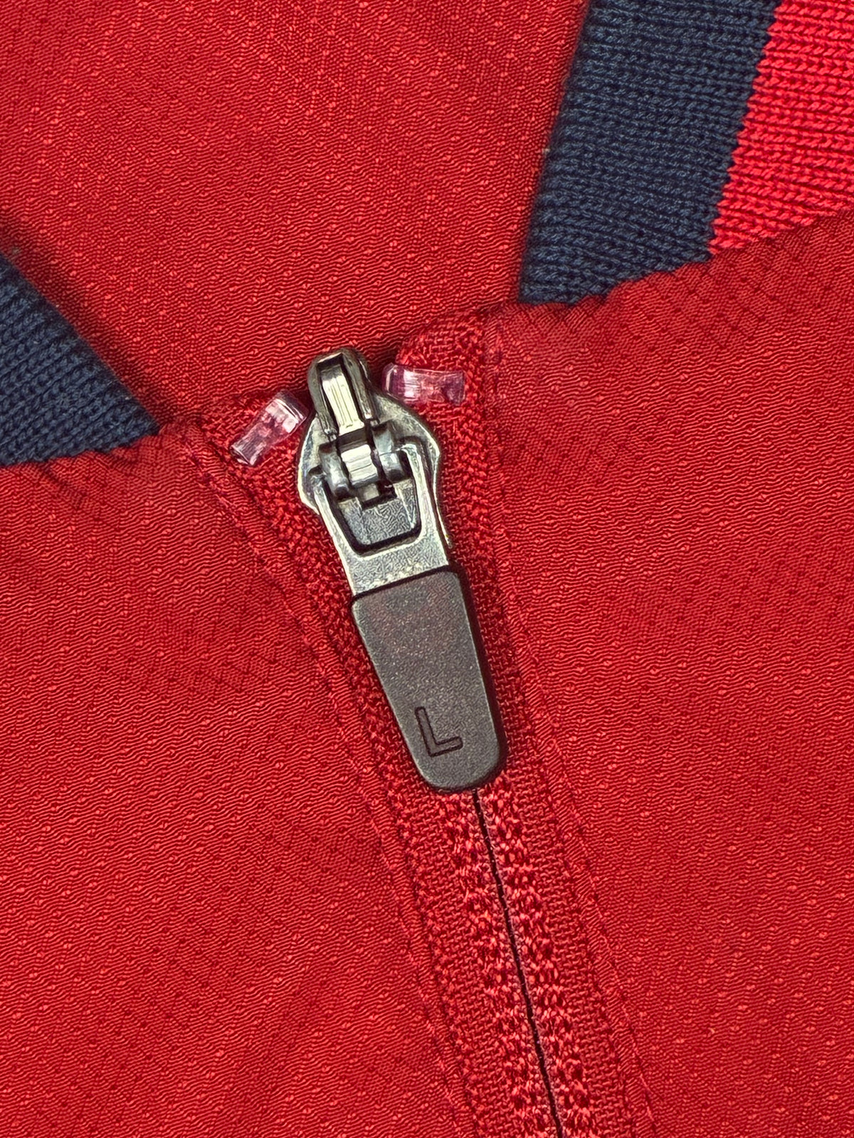 red Lacoste windbreaker {S}