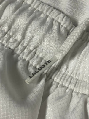 white/black Lacoste trackpants {L}