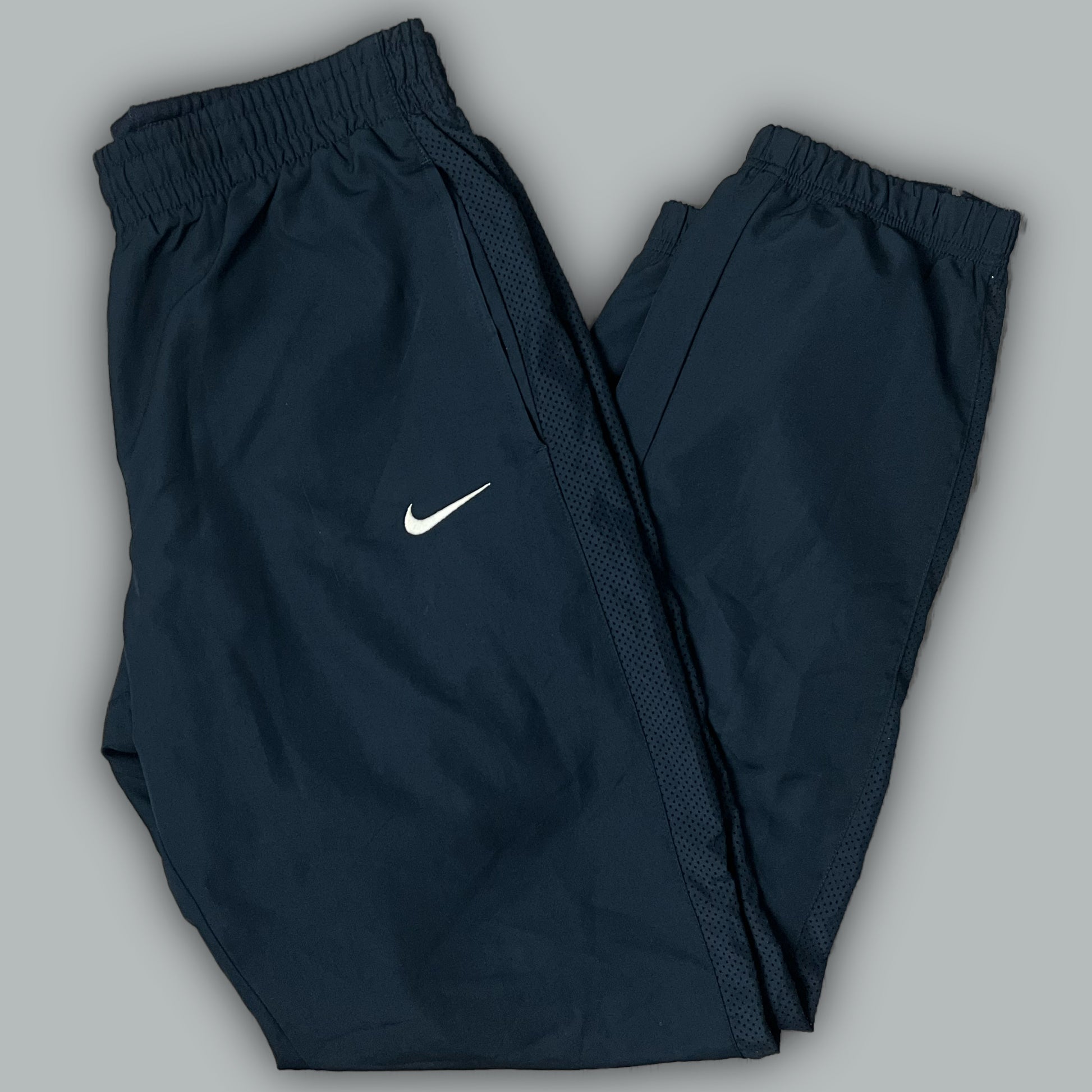 vintage Nike trackpants {M}