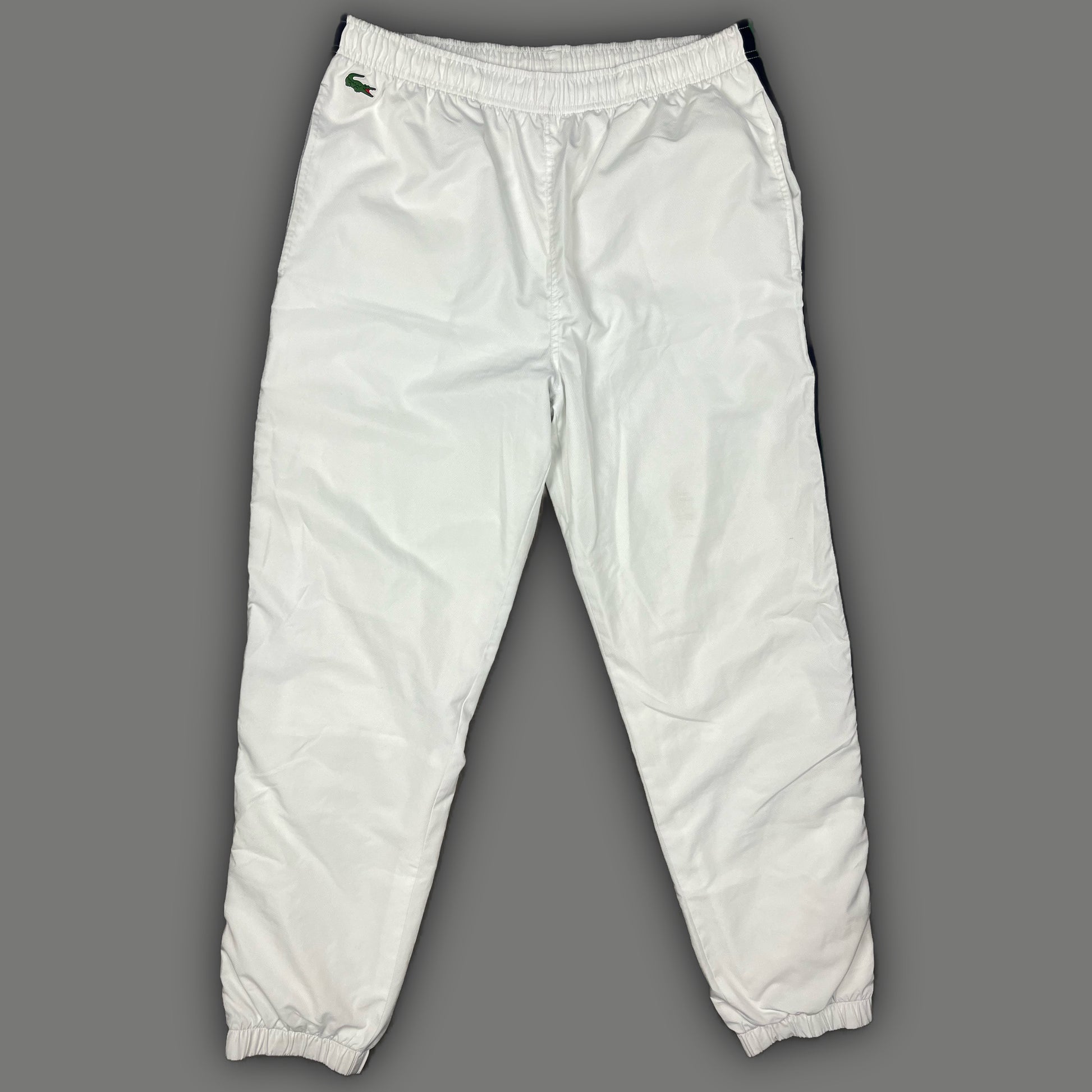 white Lacoste trackpants {XL}