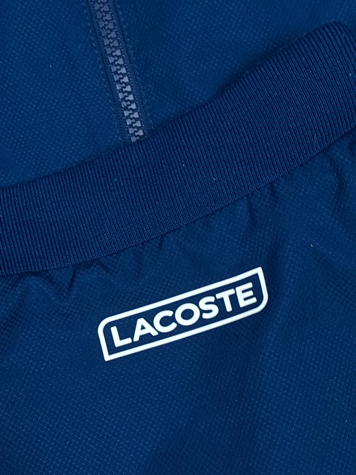 navyblue Lacoste windbreaker {S}