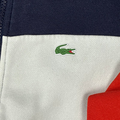 white Lacoste trackjacket {XS}