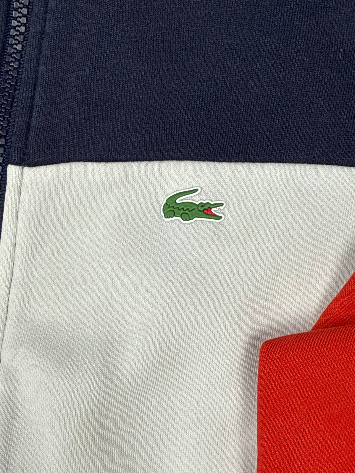 white Lacoste trackjacket {XS}