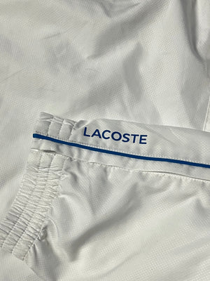 white Lacoste trackpants {S}