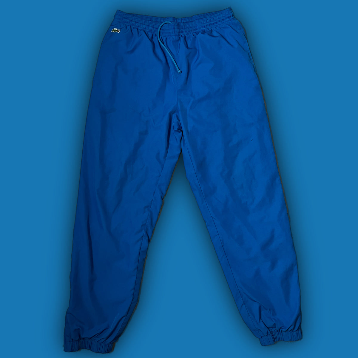vintage Lacoste trackpants {L}