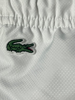 white Lacoste trackpants {S}