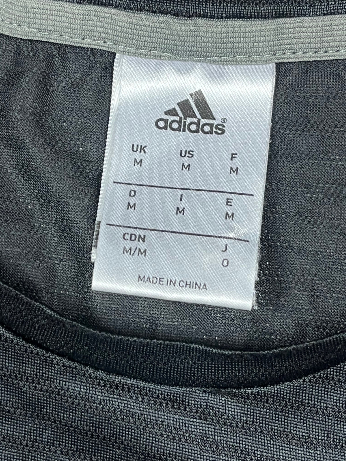 black Adidas Manchester United trainingjersey {M}