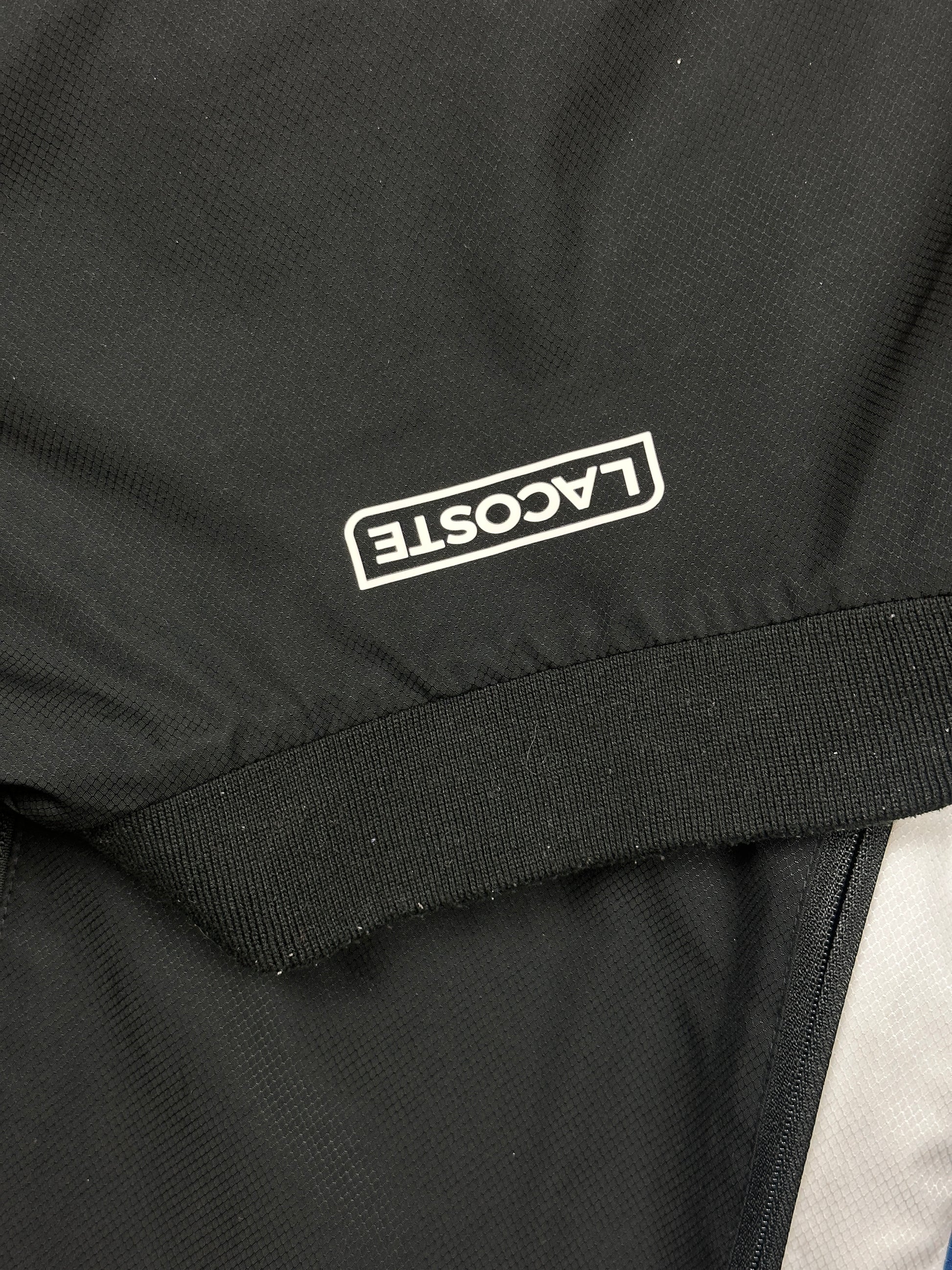 black Lacoste windbreaker {XS}