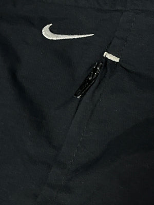 vintage Nike trackpants {L}