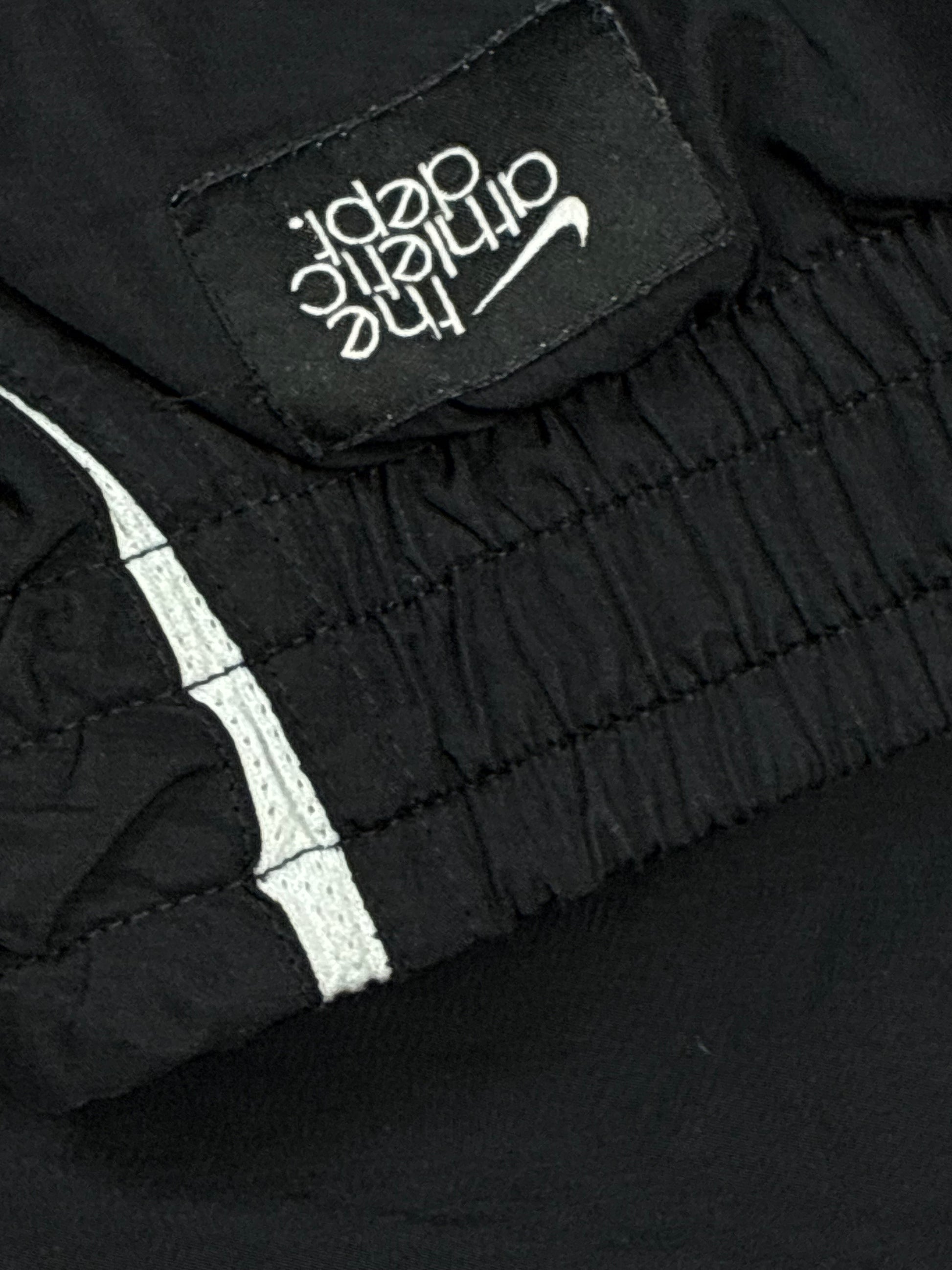 vintage Nike trackpants {S}