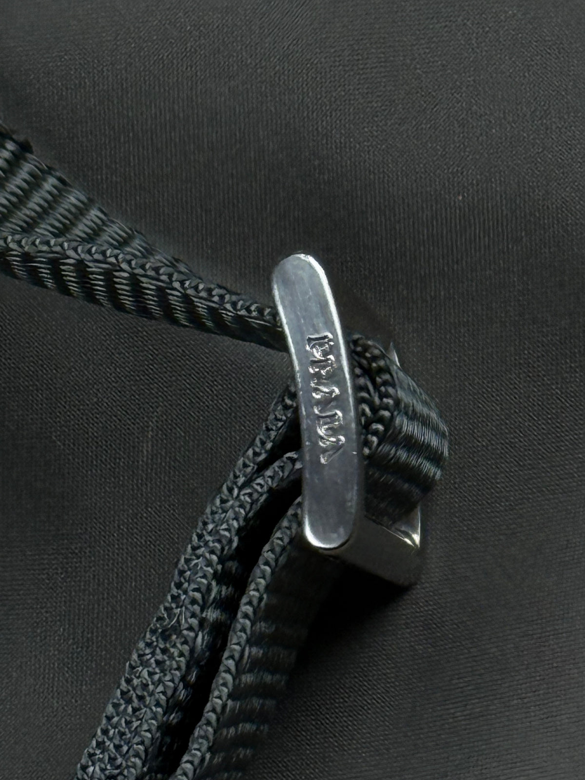 vintage grey Prada slingbag