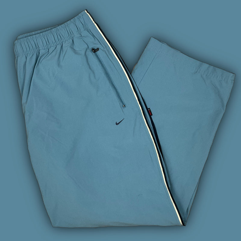 vintage babyblue Nike trackpants {XL}