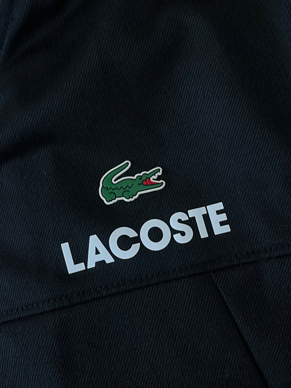 black Lacoste trackjacket {L}