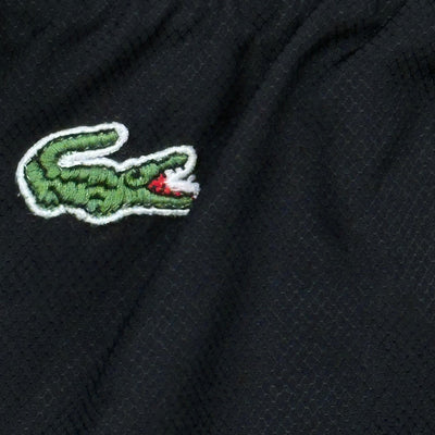 vintage Lacoste trackpants {L}