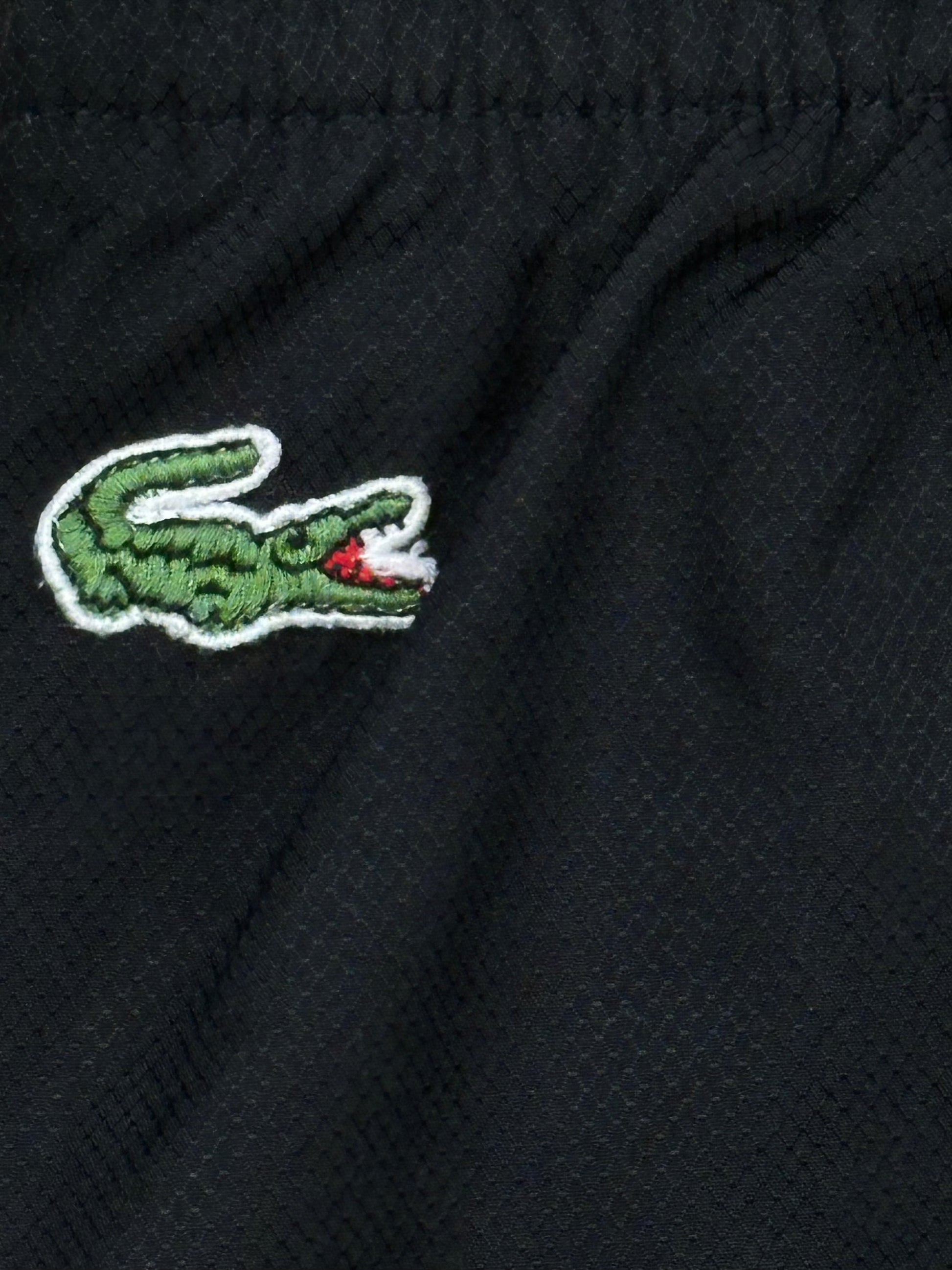 vintage Lacoste trackpants {L}