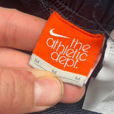 vintage Nike trackpants {M}