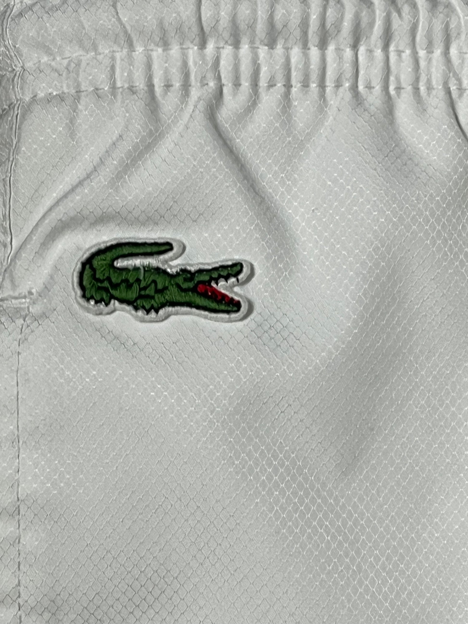 vintage white Lacoste trackpants {L}