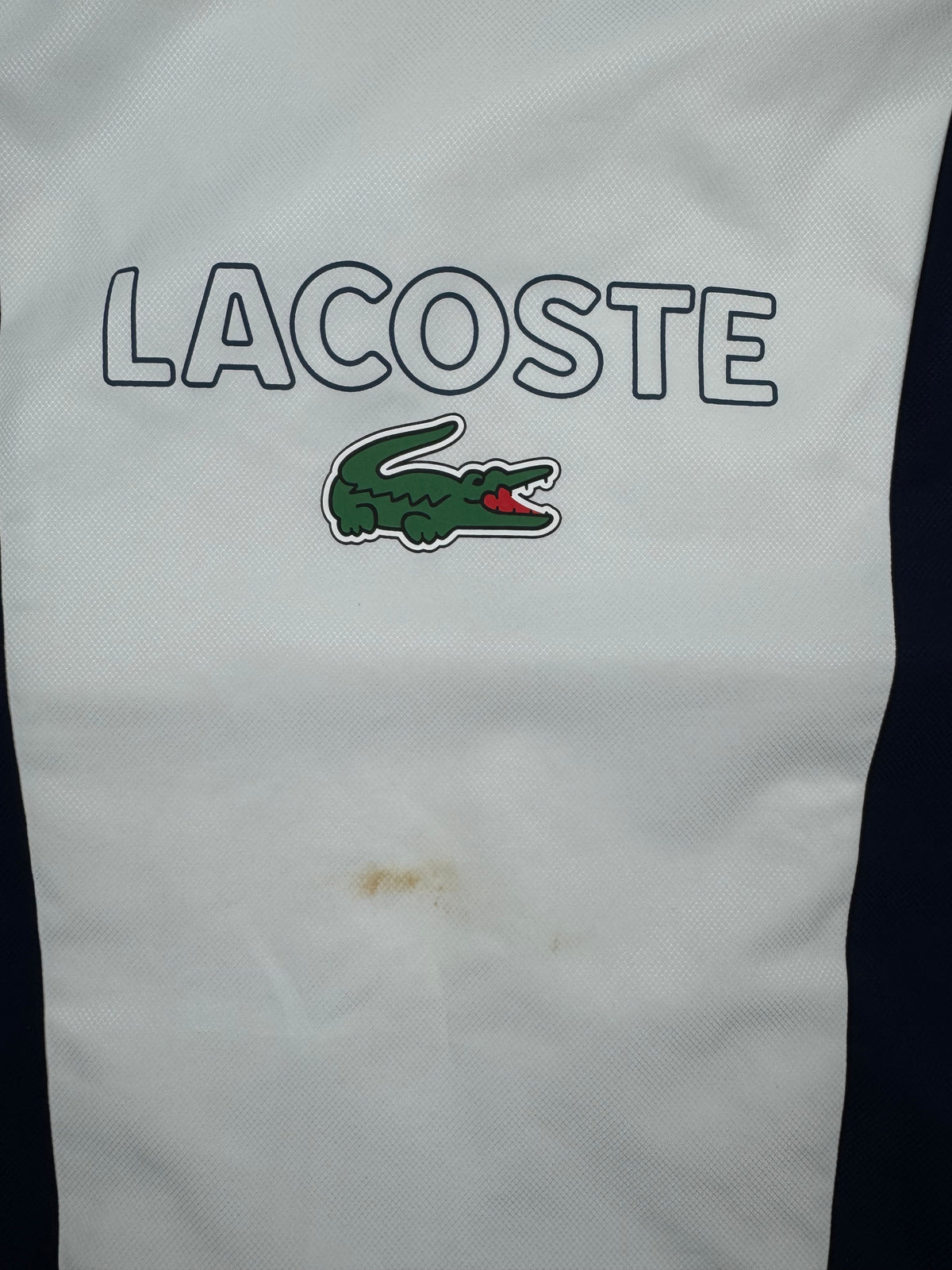 white Lacoste windbreaker {S}