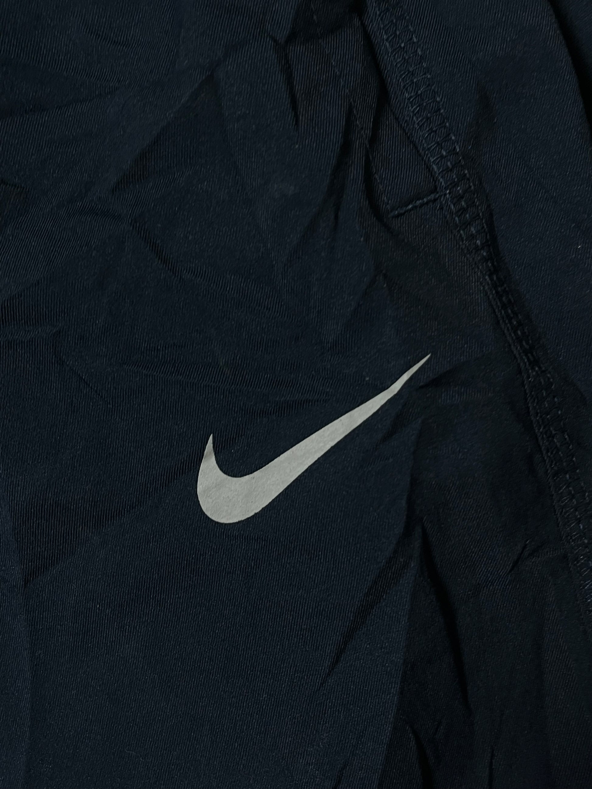 vintage Nike trackpants {M}