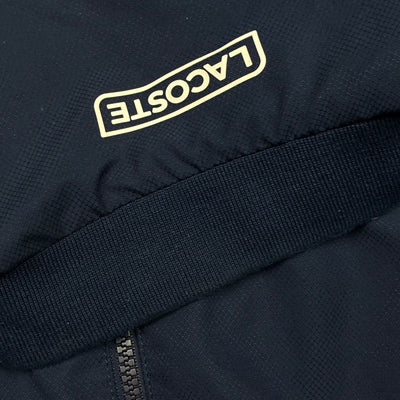 navyblue Lacoste windbreaker {S}