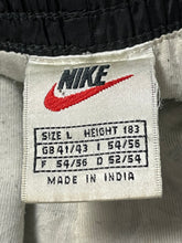 Load image into Gallery viewer, vintage Nike trackpants {L}
