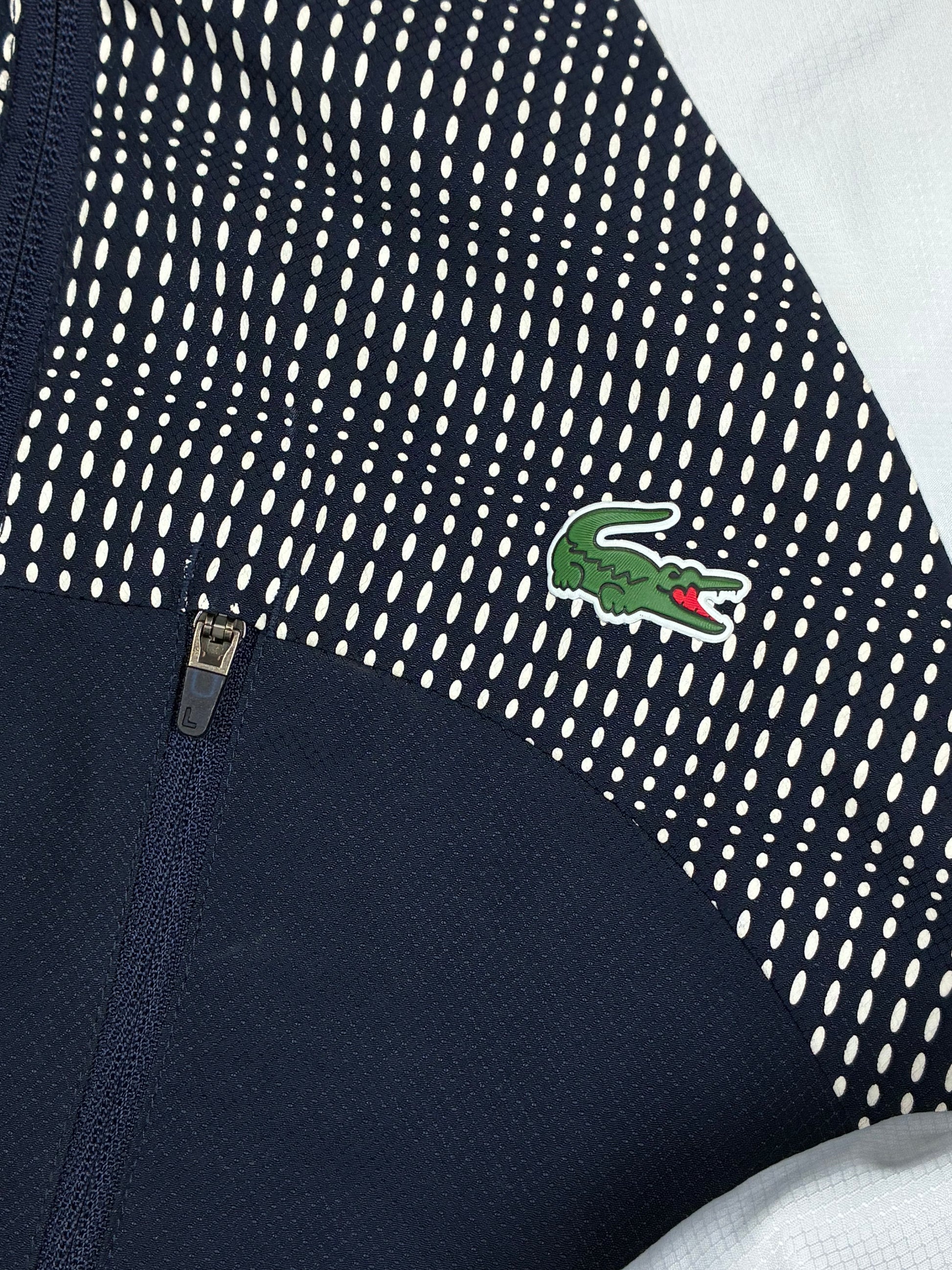 navyblue Lacoste windbreaker {XS}