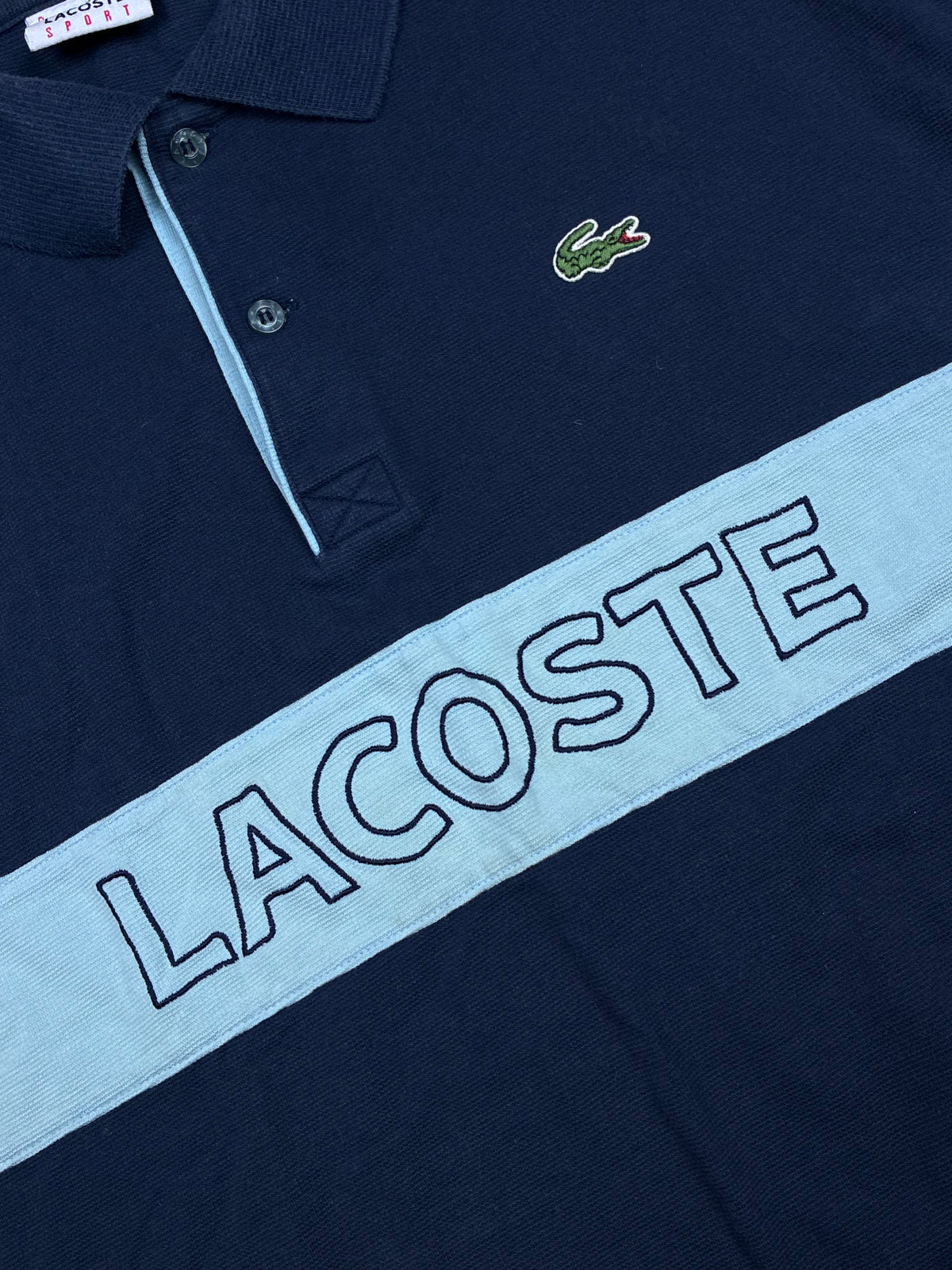 vintage Lacoste polo spellout {XL}