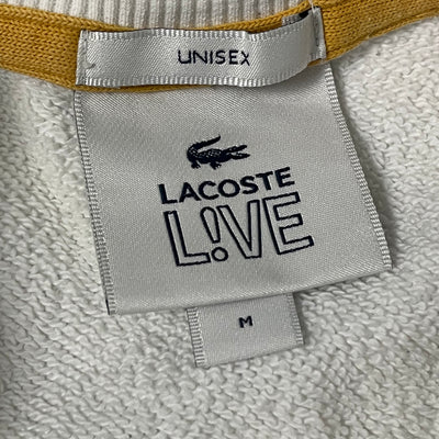 yellow Lacoste spellout sweater {M}