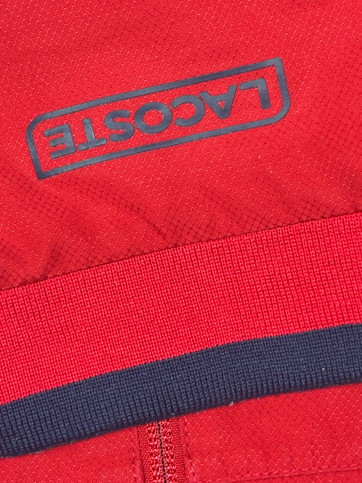 red Lacoste windbreaker {S}