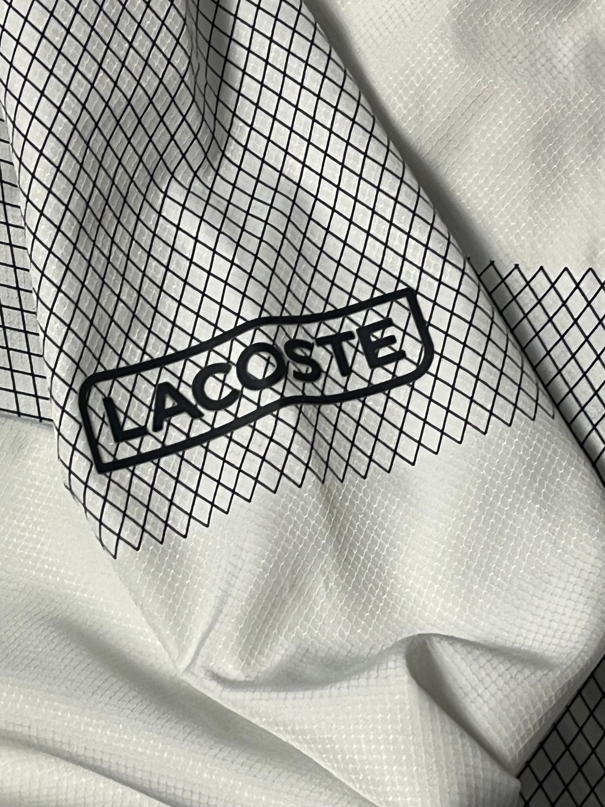 white Lacoste windbreaker {M}