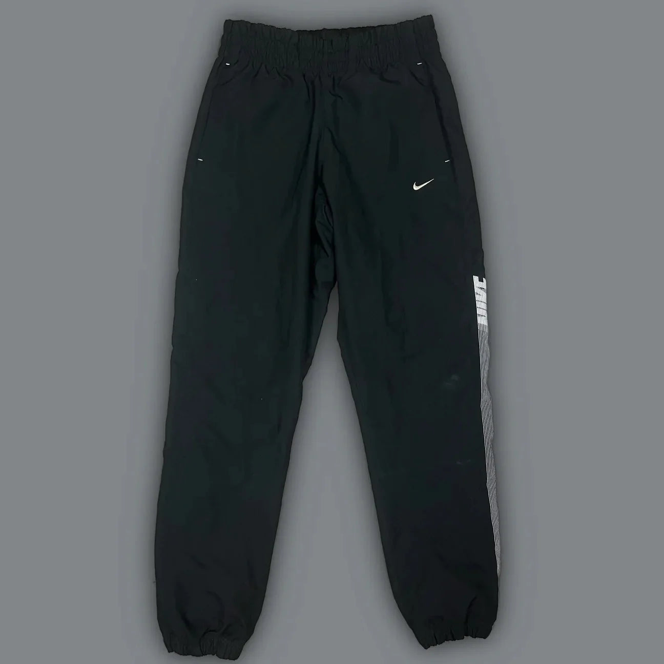 vintage Nike trackpants {S}