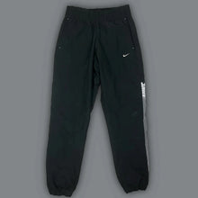 Load image into Gallery viewer, vintage Nike trackpants {S}
