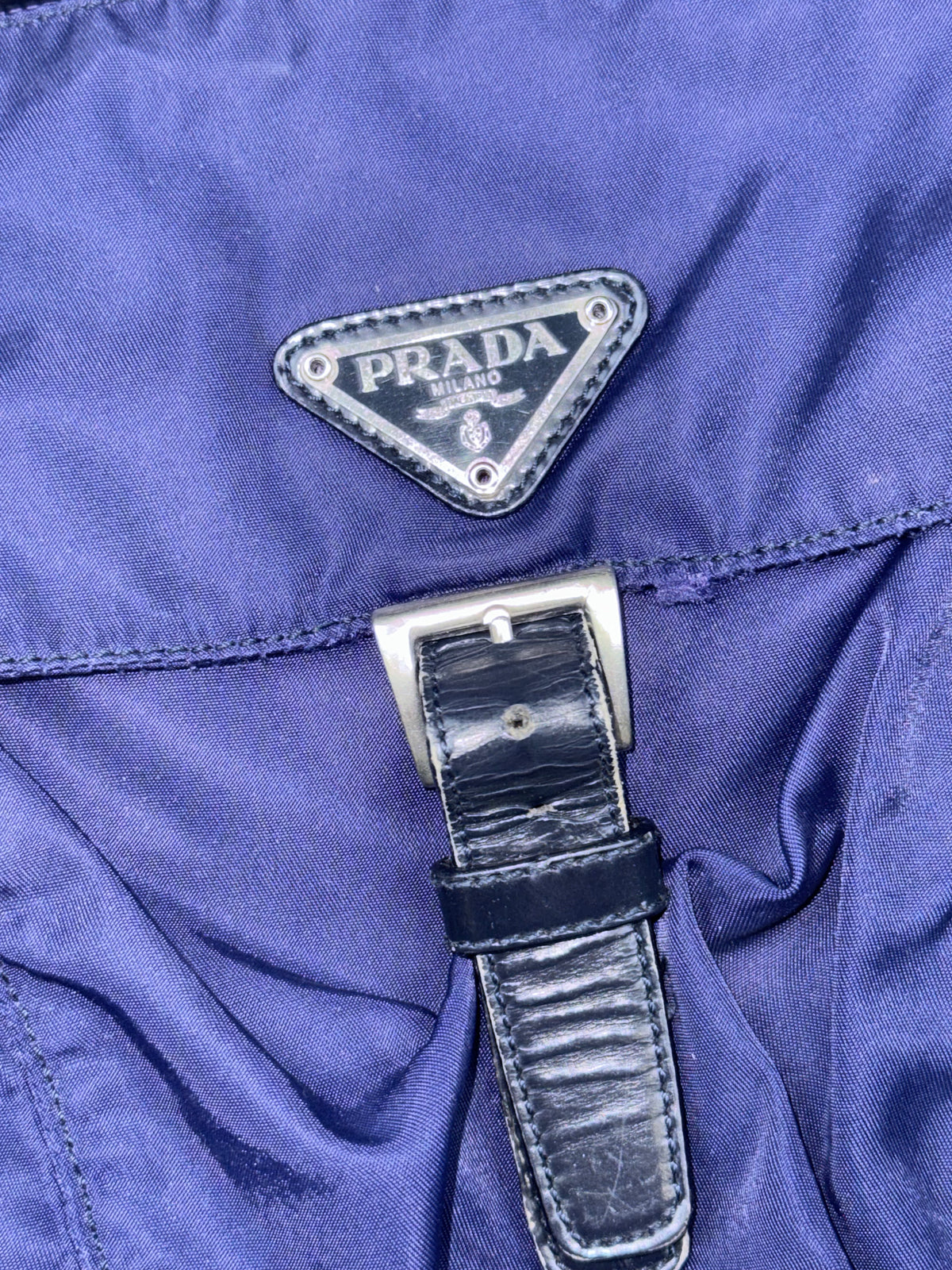 vintage purple Prada slingbag