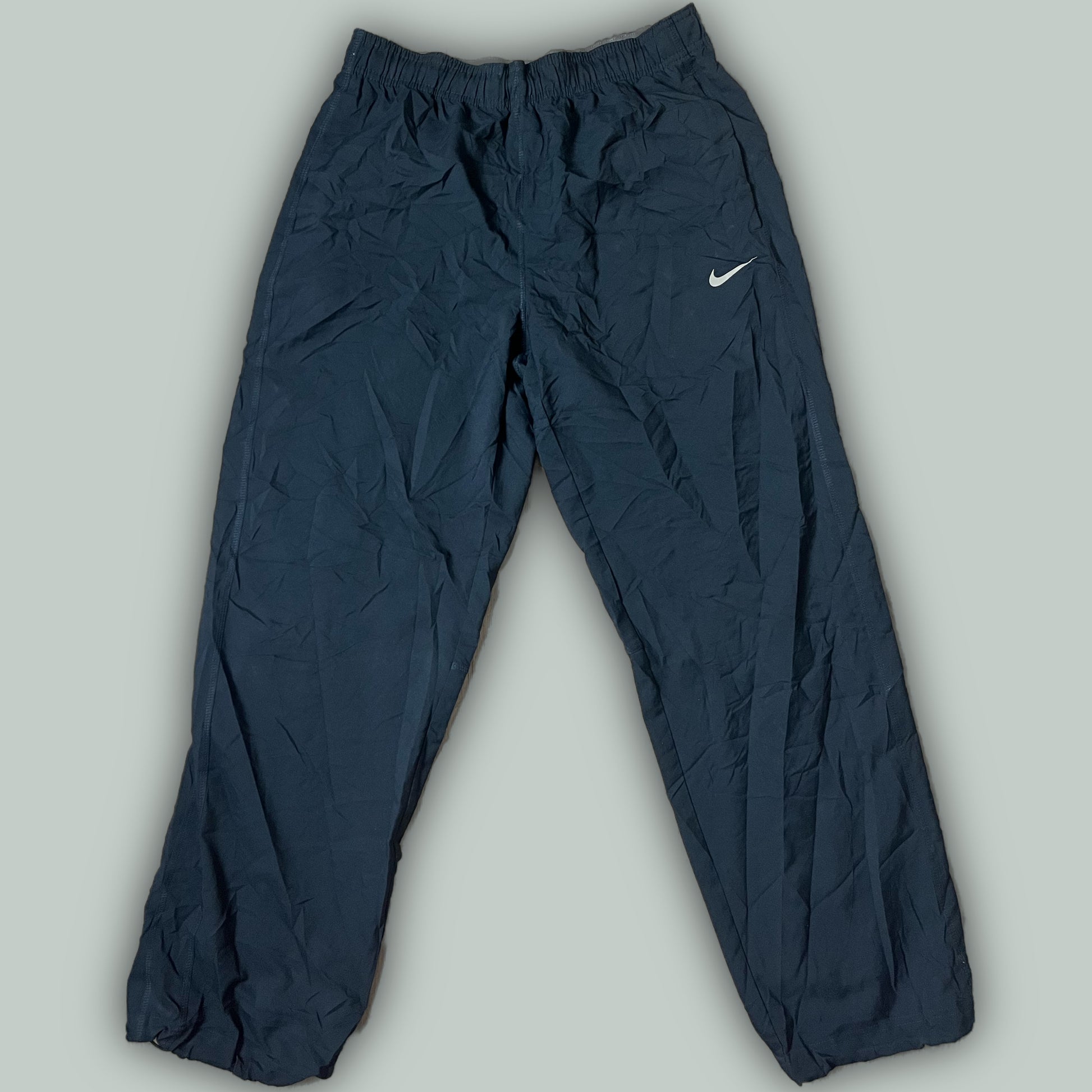 vintage Nike trackpants {M}