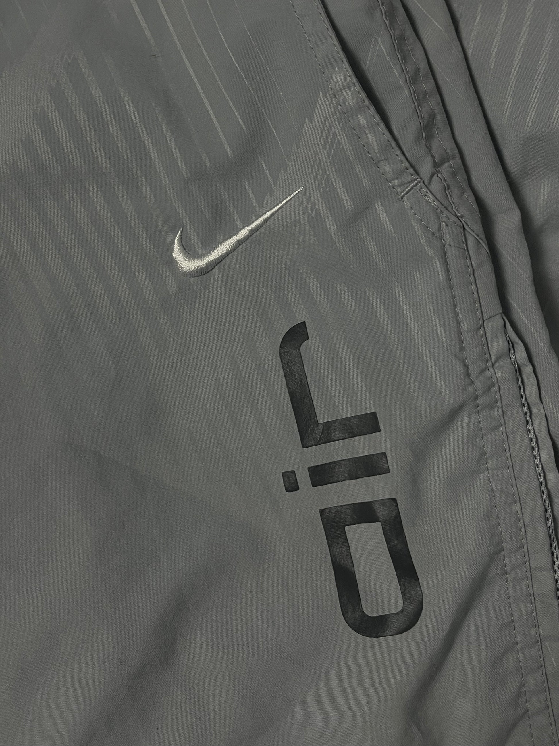 vintage Nike trackpants {S}