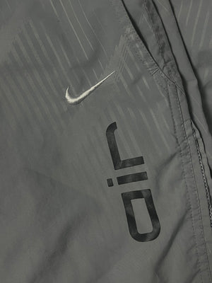 vintage Nike trackpants {S}