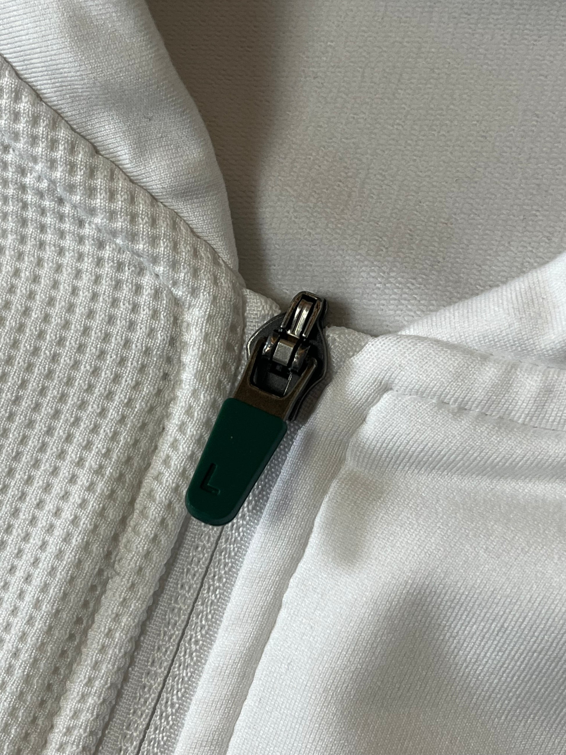 white Lacoste trackjacket {XL}