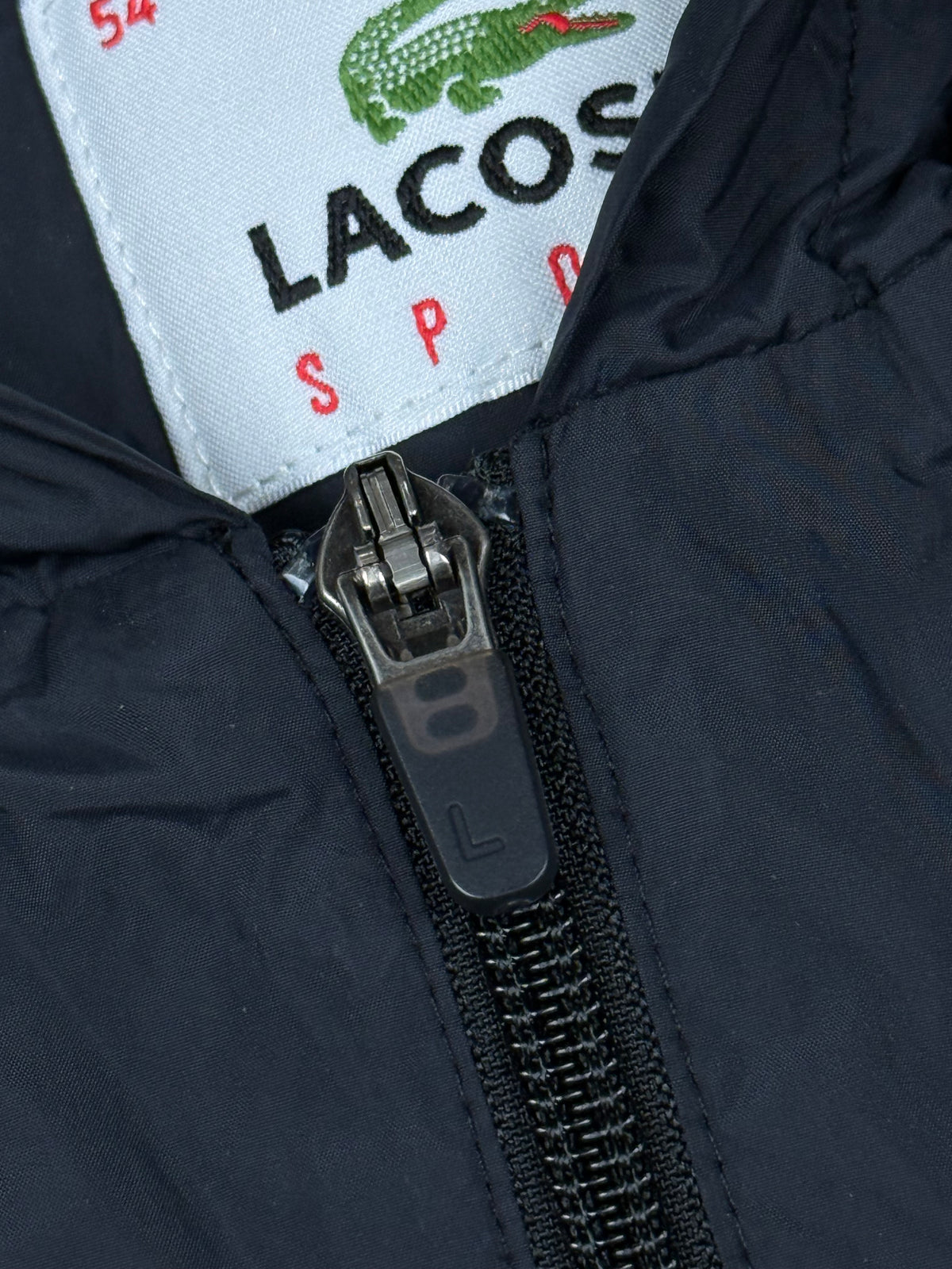 vintage Lacoste windbreaker {L}