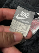 Load image into Gallery viewer, vintage Nike trackpants {XL}
