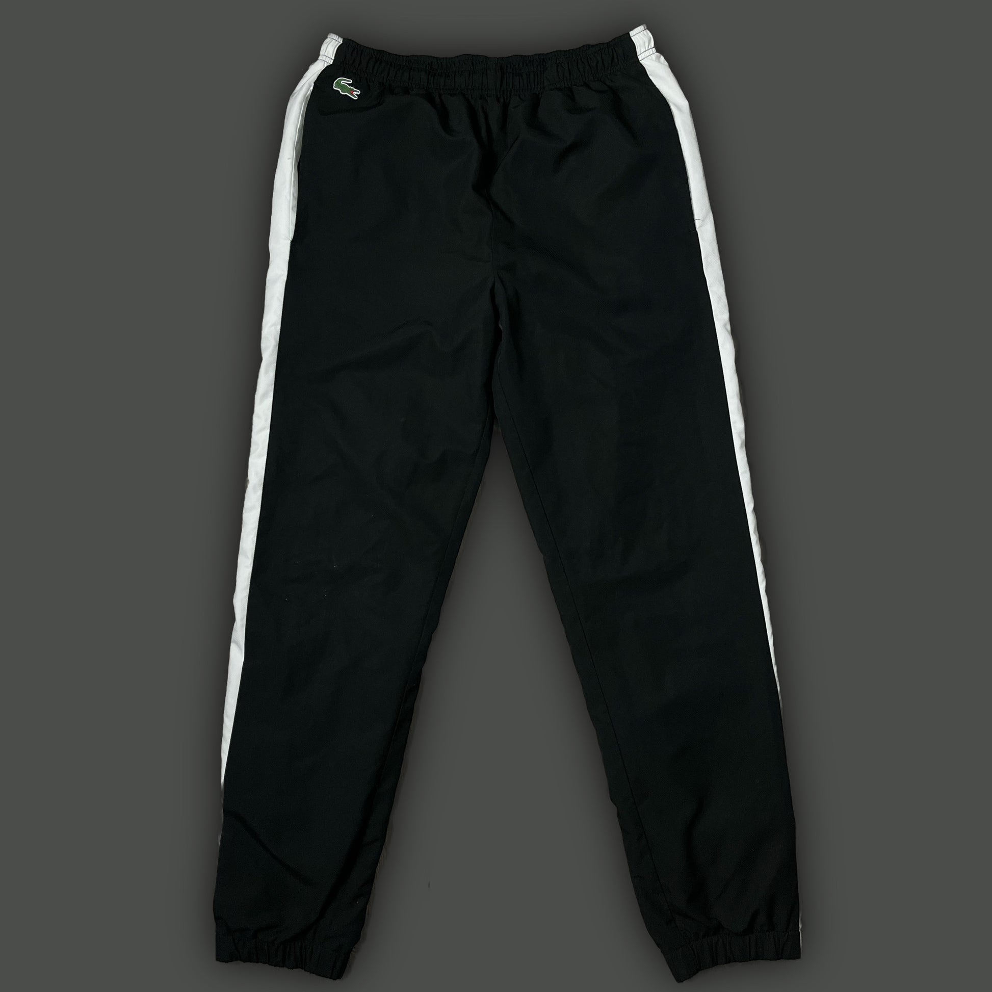 white/black Lacoste trackpants {M}