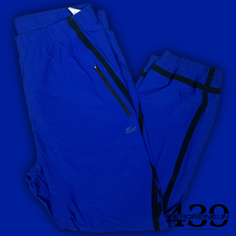 blue Lacoste trackpants {M}