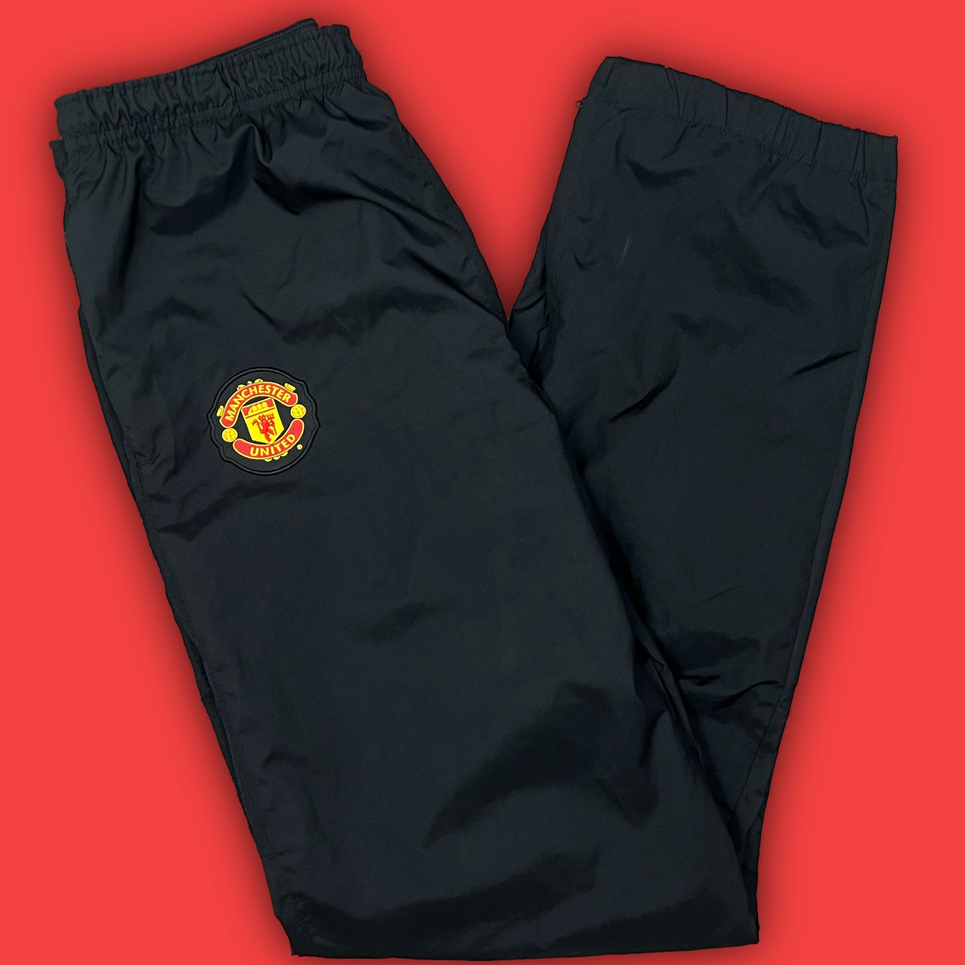 vintage Nike Manchester United trackpants {S}