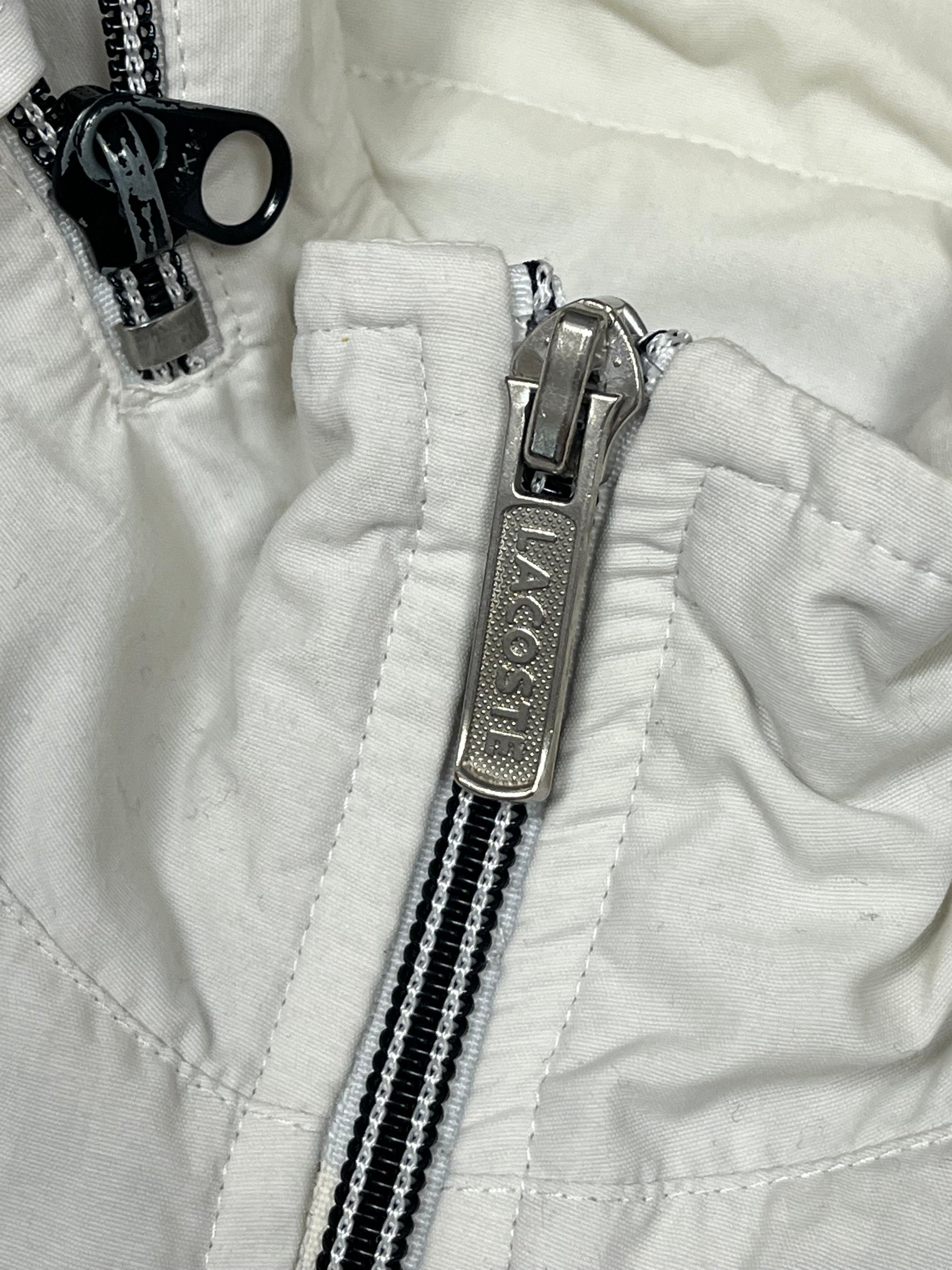 white Lacoste windbreaker {L}