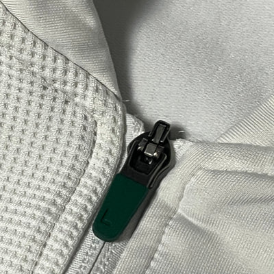 white Lacoste trackjacket {L}