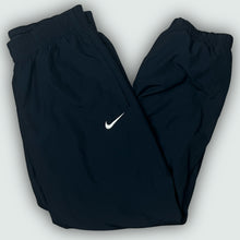 Load image into Gallery viewer, vintage Nike trackpants {XS-S}
