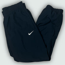 Cargar imagen en el visor de la galería, vintage Nike trackpants {XS-S}
