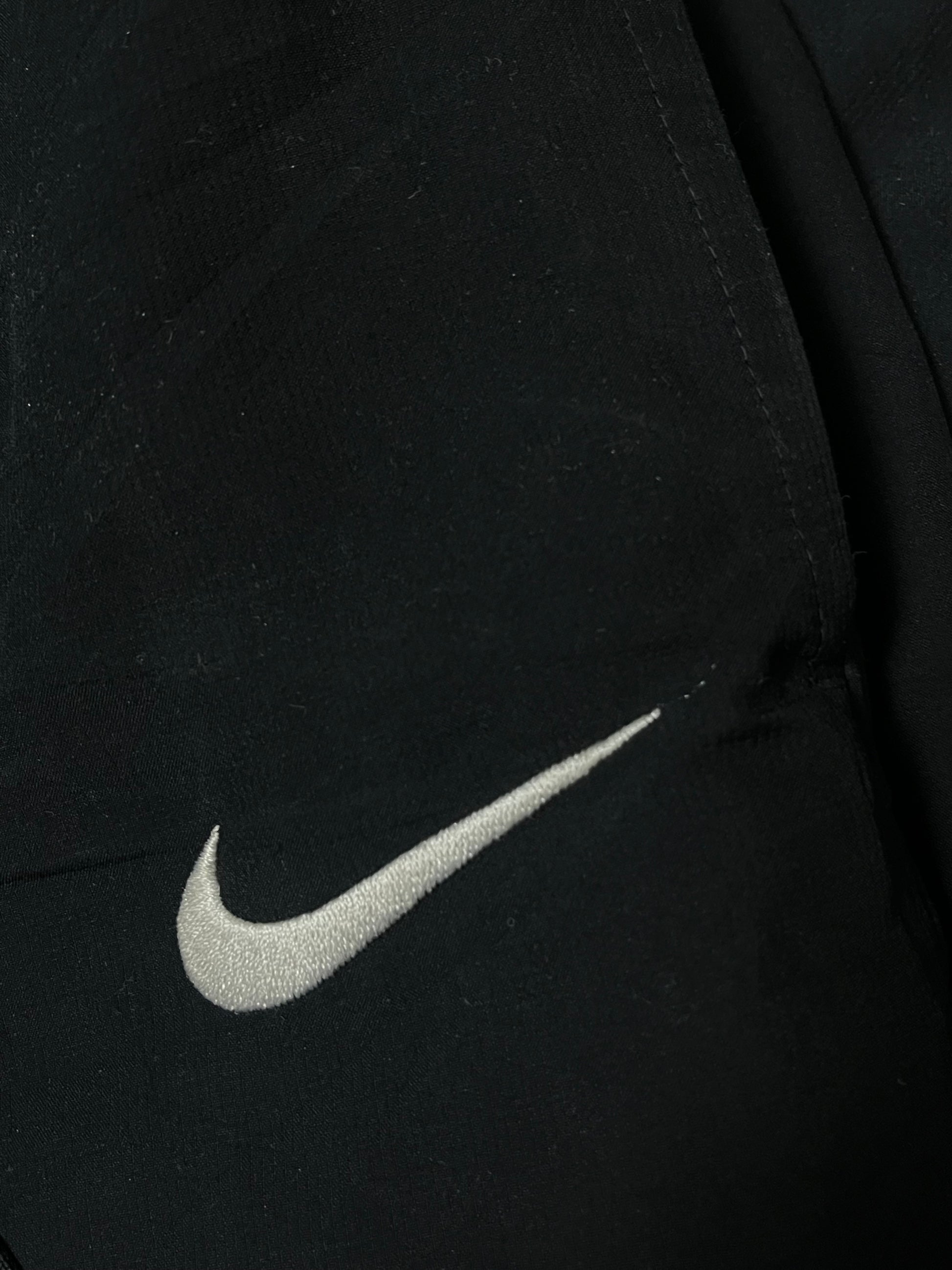 vintage Nike trackpants {L}