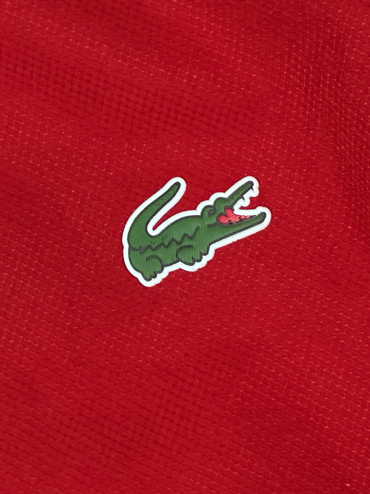 red Lacoste windbreaker {S}