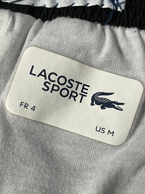 white/black Lacoste trackpants {M}